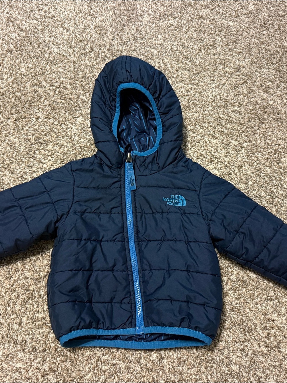 The North Face Navy Hooded Puffer Jacket with Sky Blue Trim